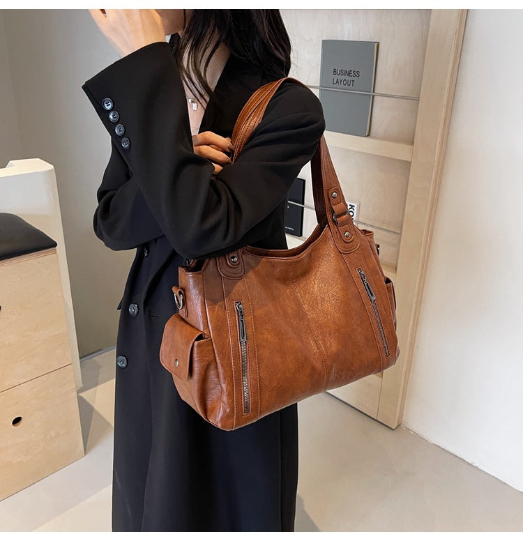 LuxeCarry™ | Leder-Tragetasche