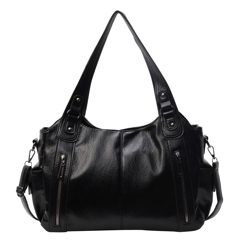 LuxeCarry™ | Leder-Tragetasche