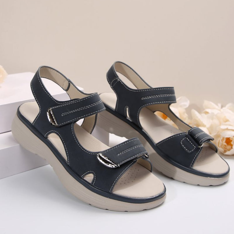 50% Rabatt | SunStyle | Damensandalen mit Keilabsatz